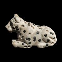 A Mesopotamian Marble and Lapis Lazuli Recumbent Leopard