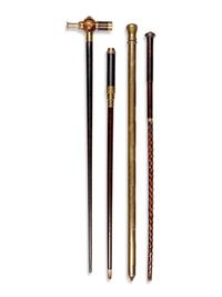 Four English Brass Mounted Explorer's Walking Sticks
