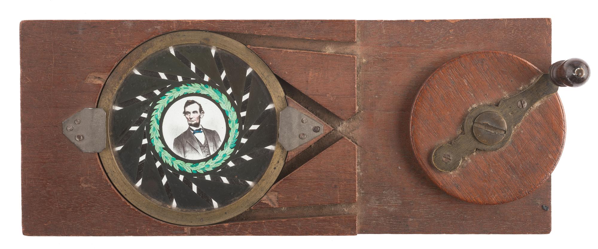 [LINCOLNIANA - MAGIC LANTERN SLIDES]. A collection of 65 assorted glass slides depicting important subjects and scenes depicting the life, death, and legacy of Abraham Lincoln, including: