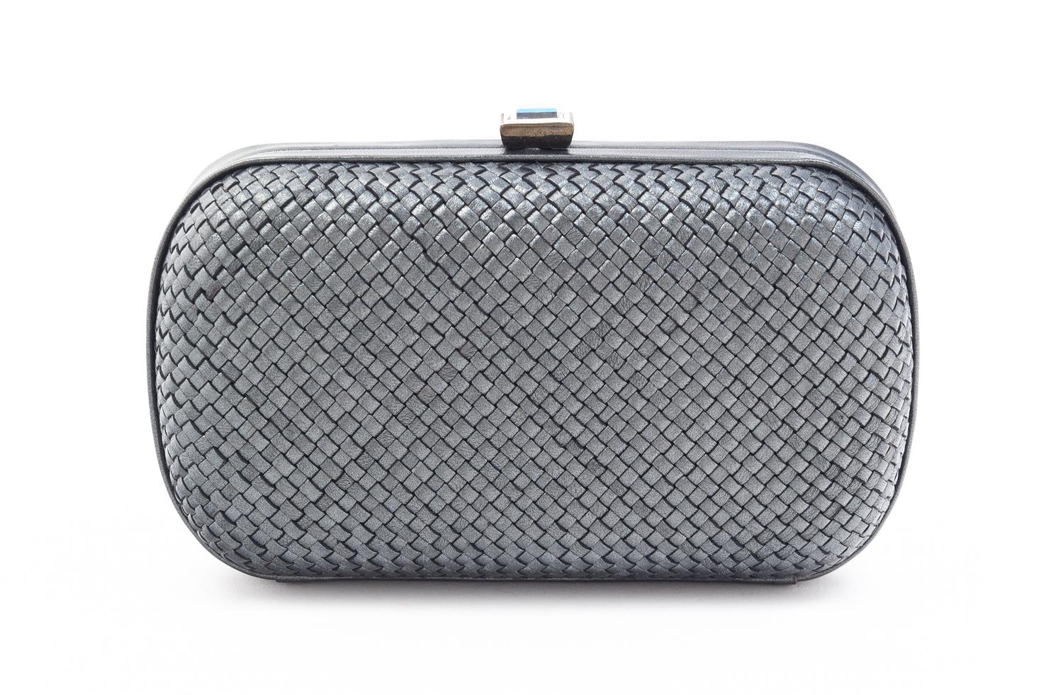 A Bottega Veneta Grey Intrecciato Leather Clutch, 6.5" x 4" x 2".