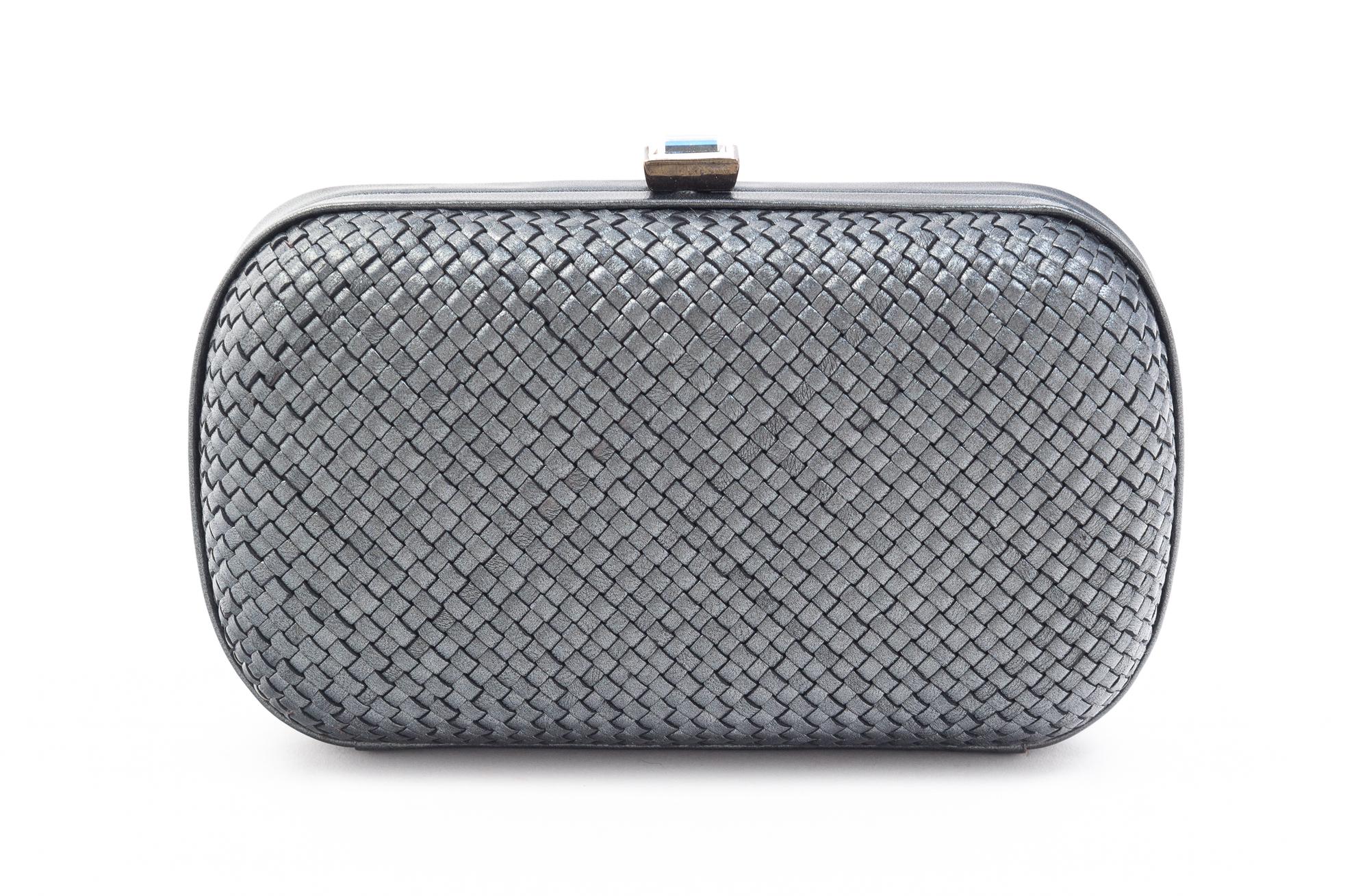 A Bottega Veneta Grey Intrecciato Leather Clutch, 6.5" x 4" x 2".