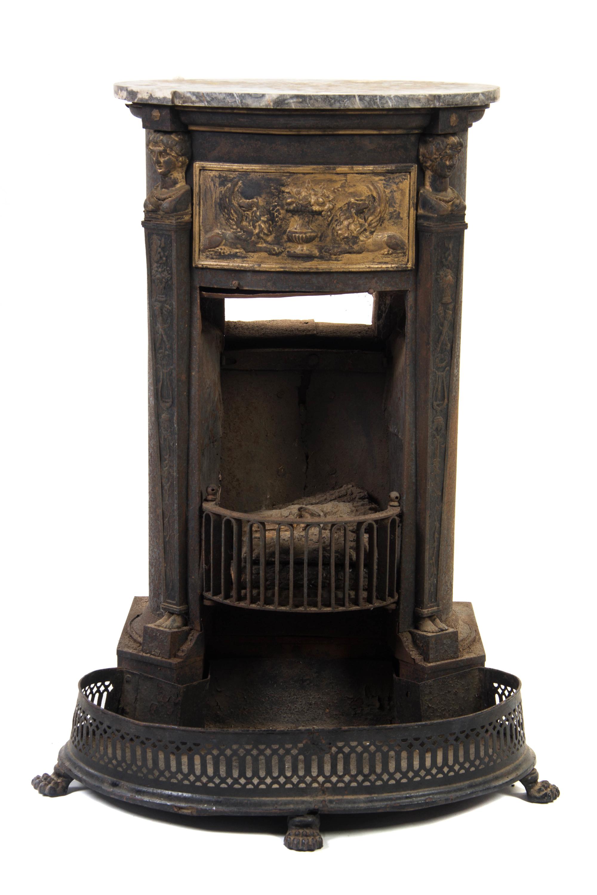 A Continental Iron Stove, Height 43 x width 21 1/4 inches.