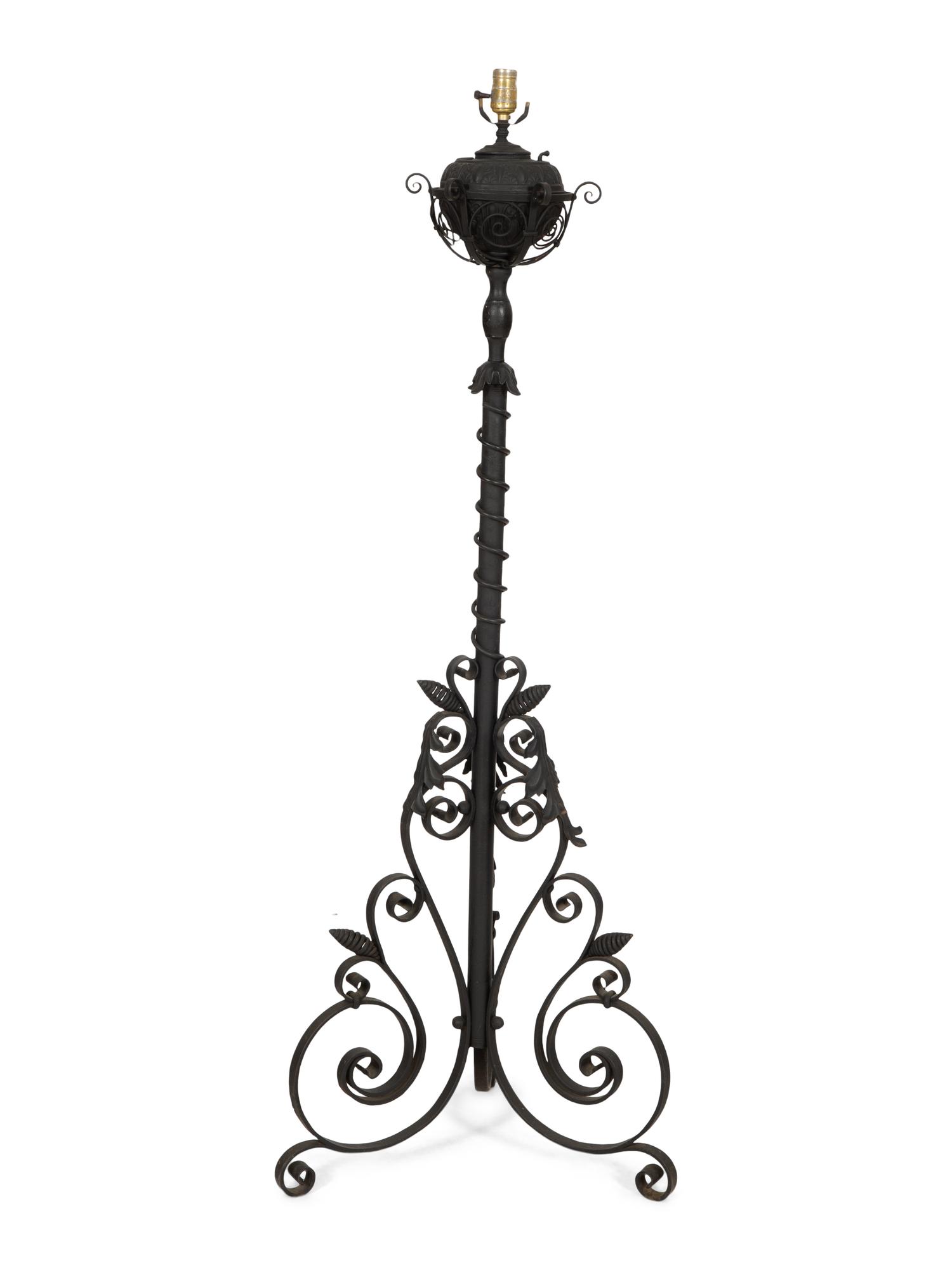 A Painted Wrought Iron Torchère Mounted as a Floor Lamp