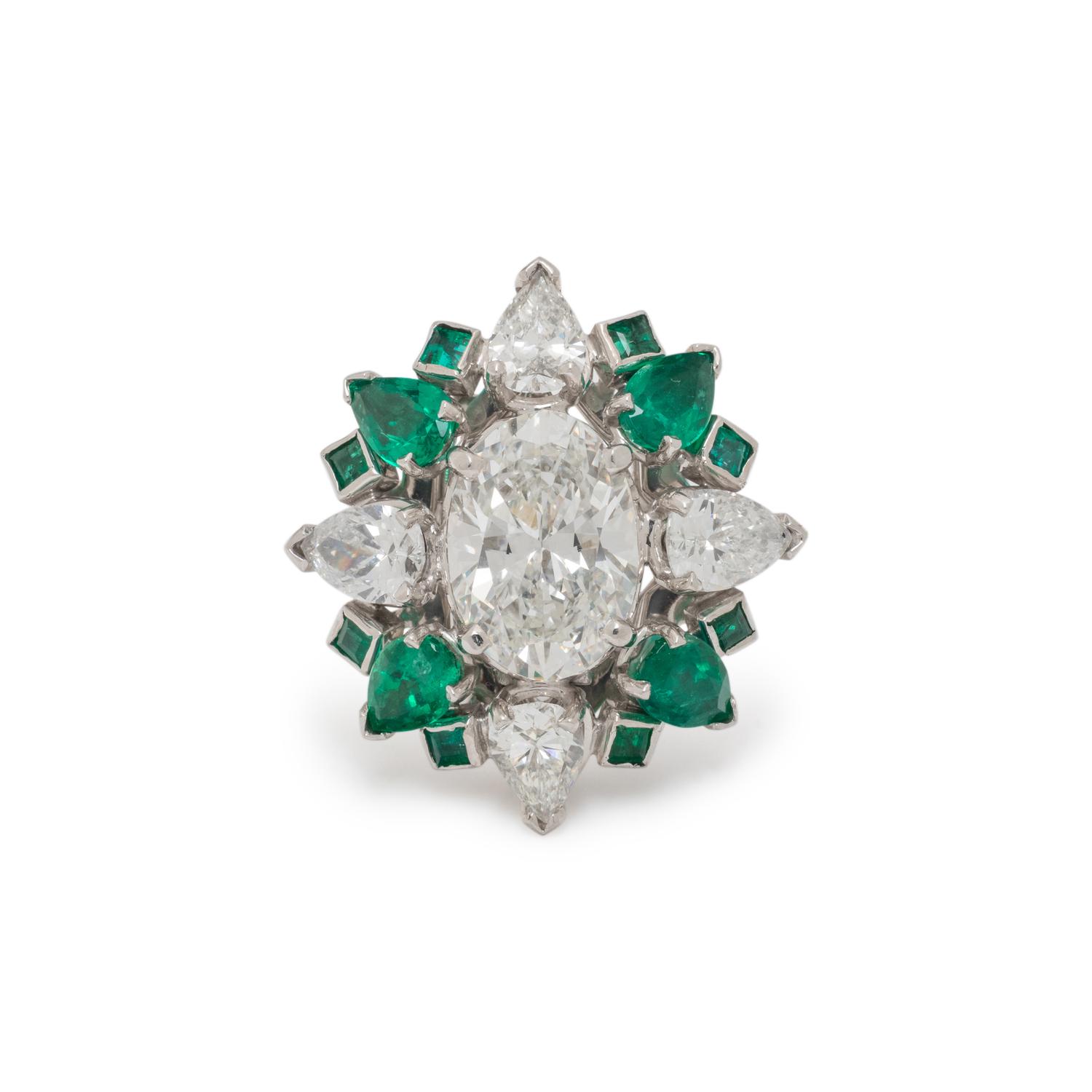 DIAMOND, EMERALD AND PLATINUM RING PENDANT