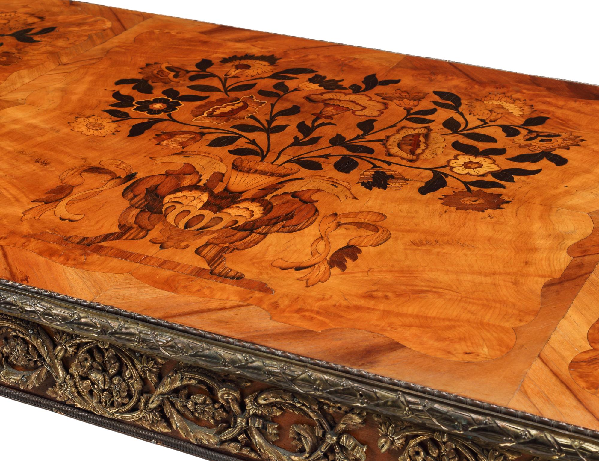 A Louis XVI Style Gilt Bronze Mounted Marquetry Table