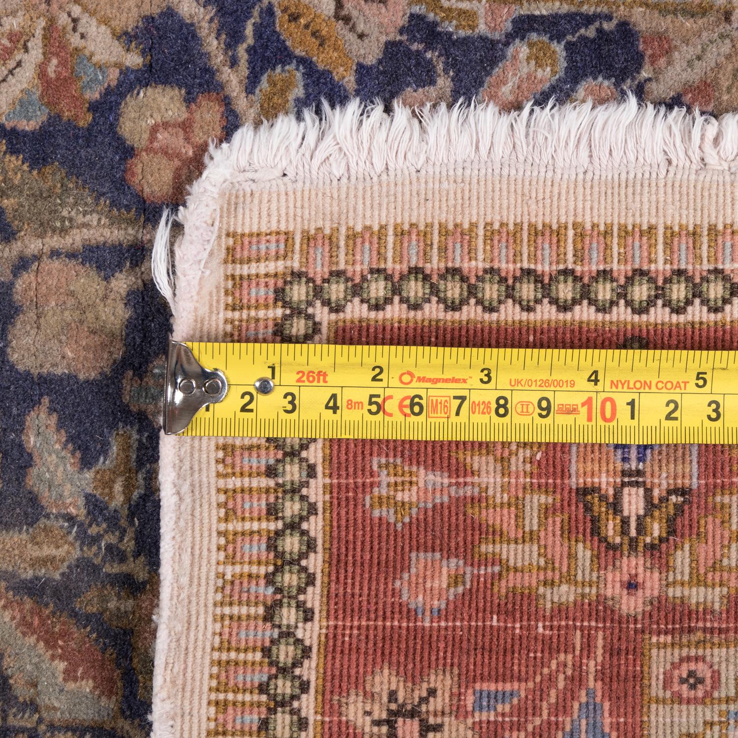 A Tabriz Wool Rug