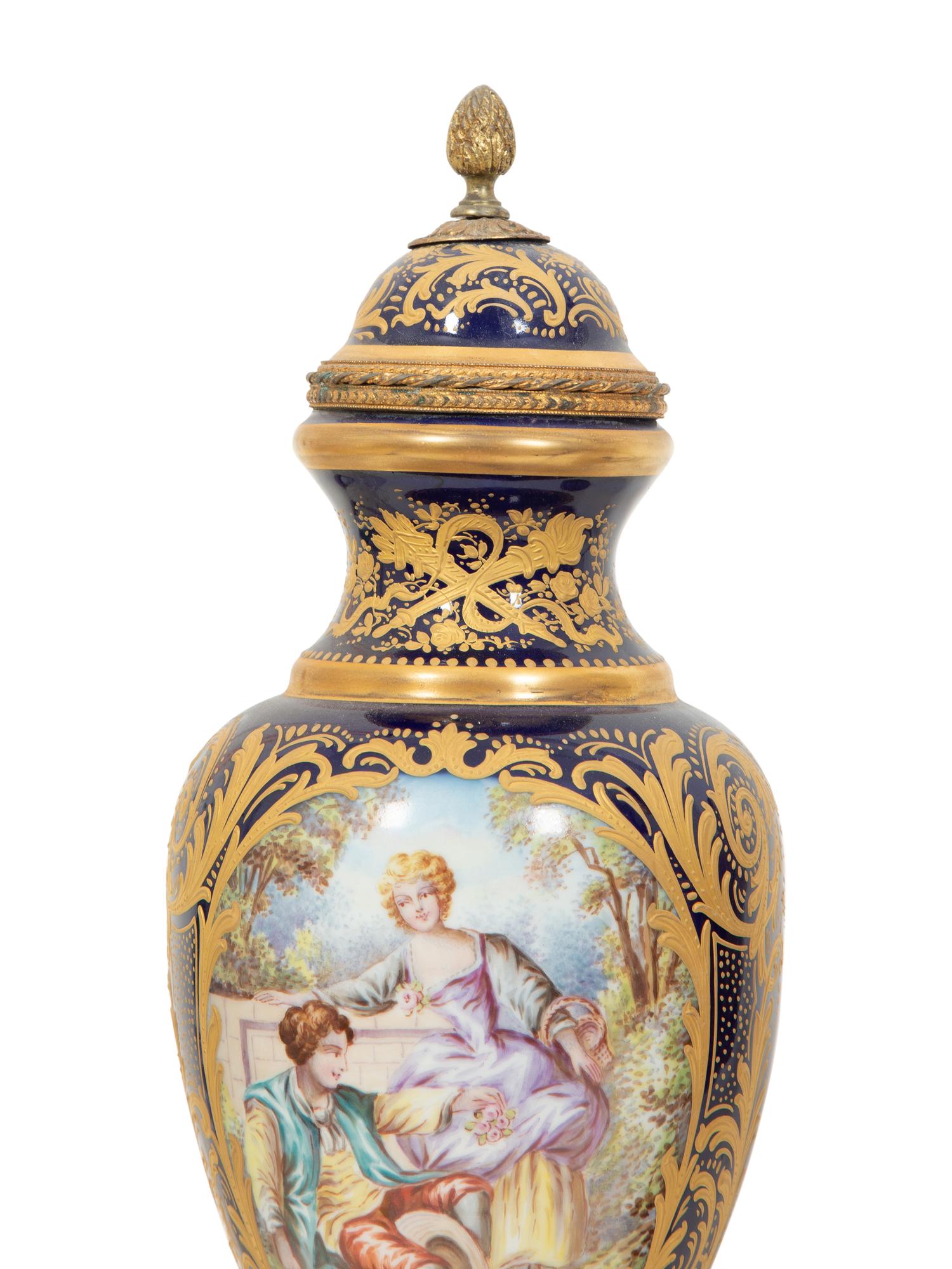 A Sèvres Style Gilt Metal Mounted Porcelain Garniture