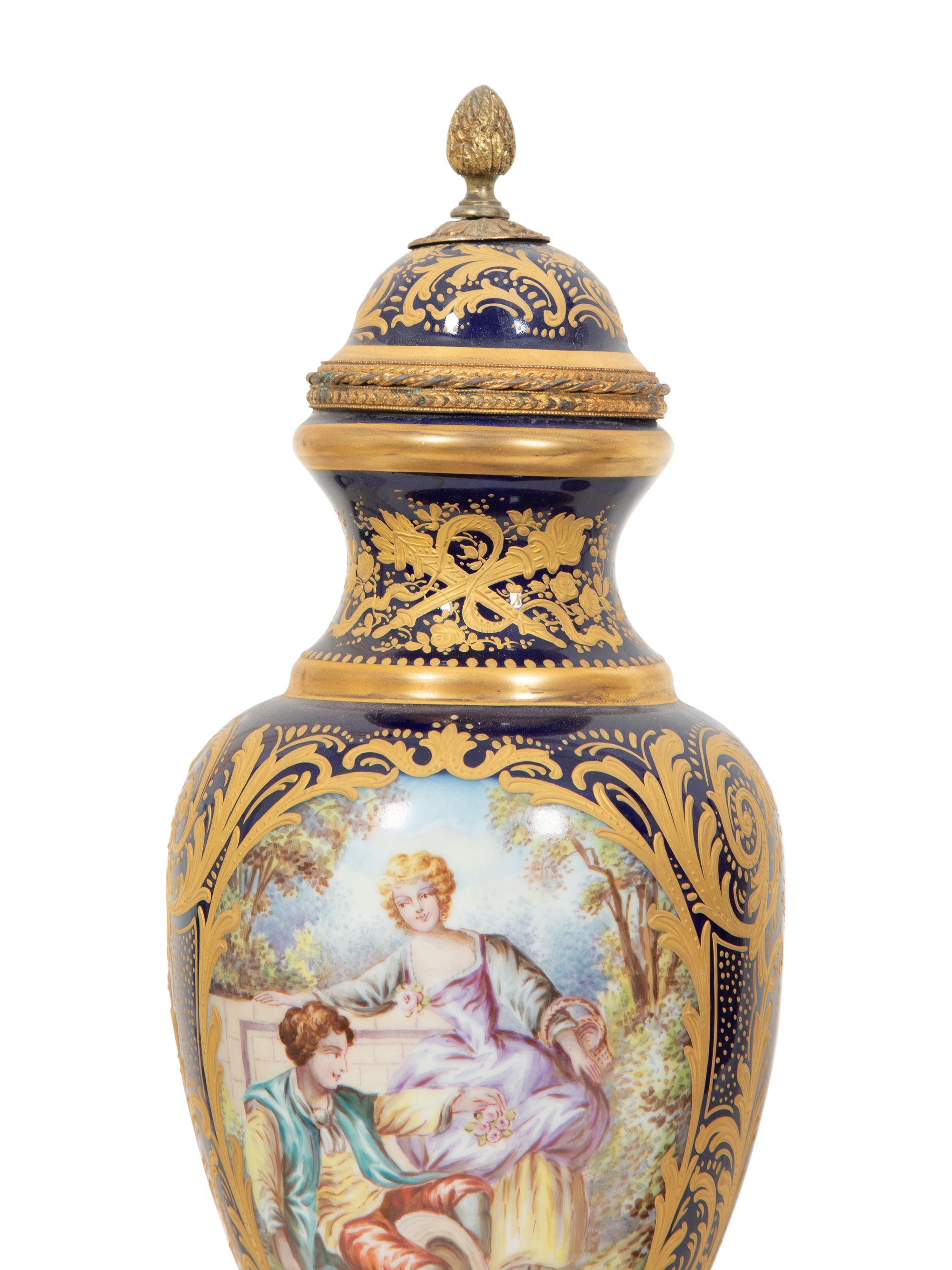 A Sèvres Style Gilt Metal Mounted Porcelain Garniture
