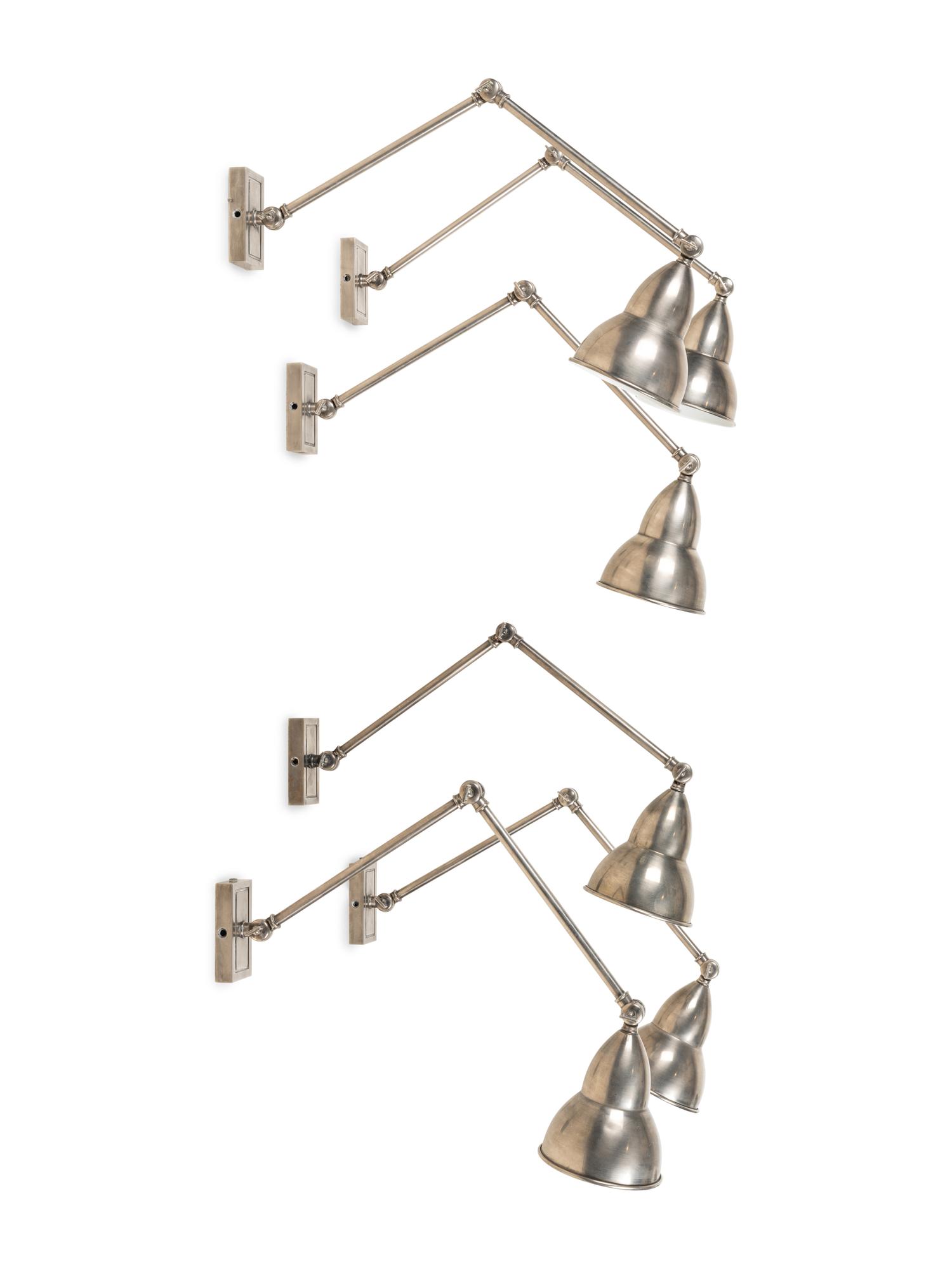 A Set of Six Swing-Arm Wall Lights