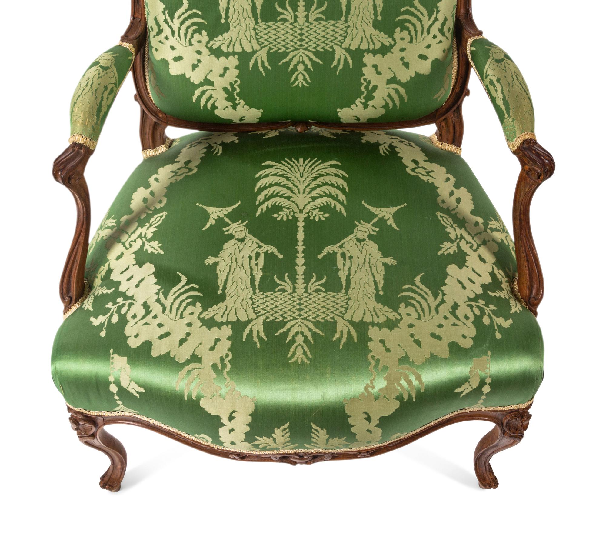 A Pair of Louis XV Beechwood Fauteuils