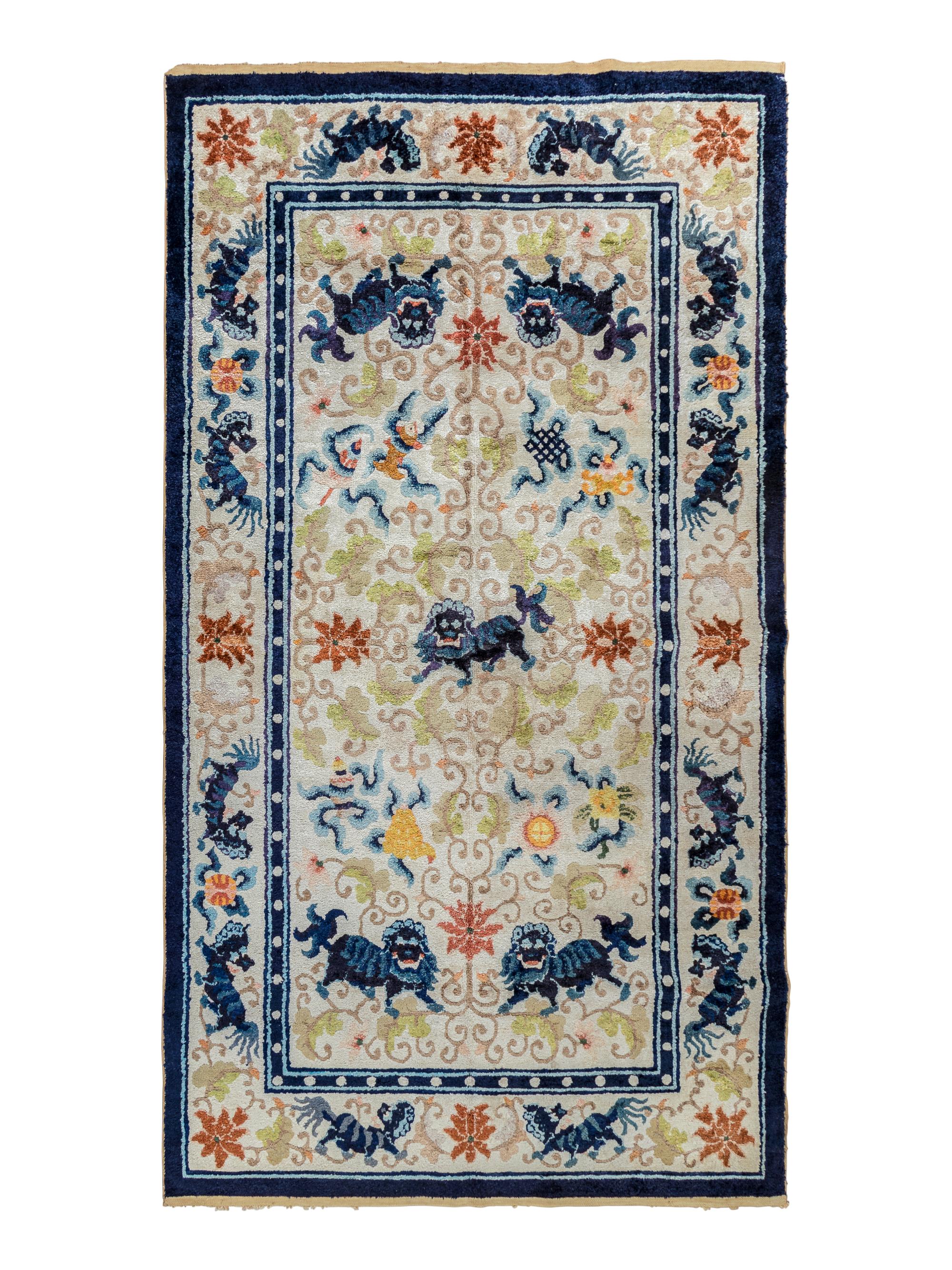 A Chinese Silk Rug with Lions