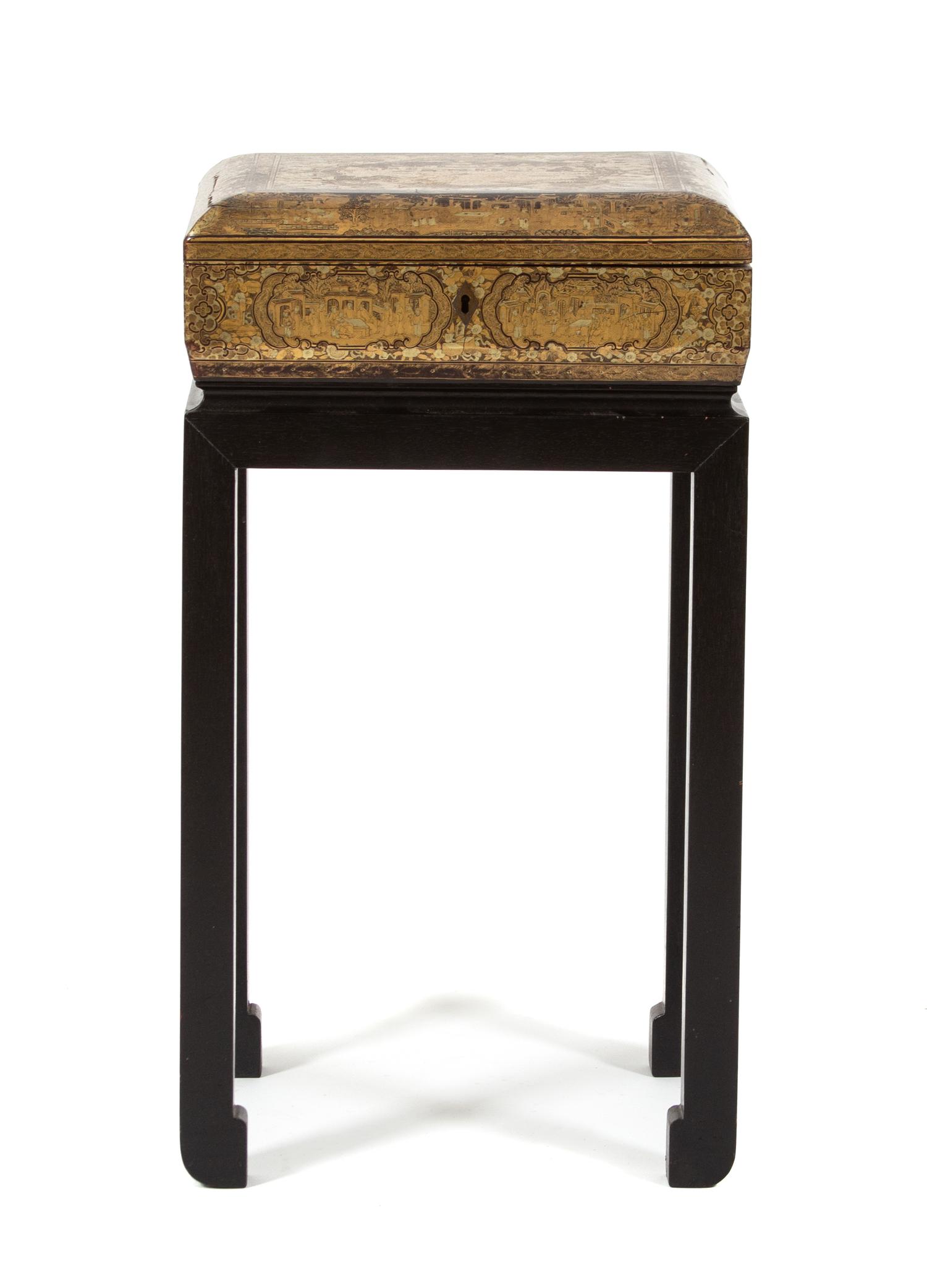 A Chinoiserie Brown and Gilt Lacquered Sewing Box on Stand Height overall 22 x width 12 x depth 10 inches. — 20TH CENTURY