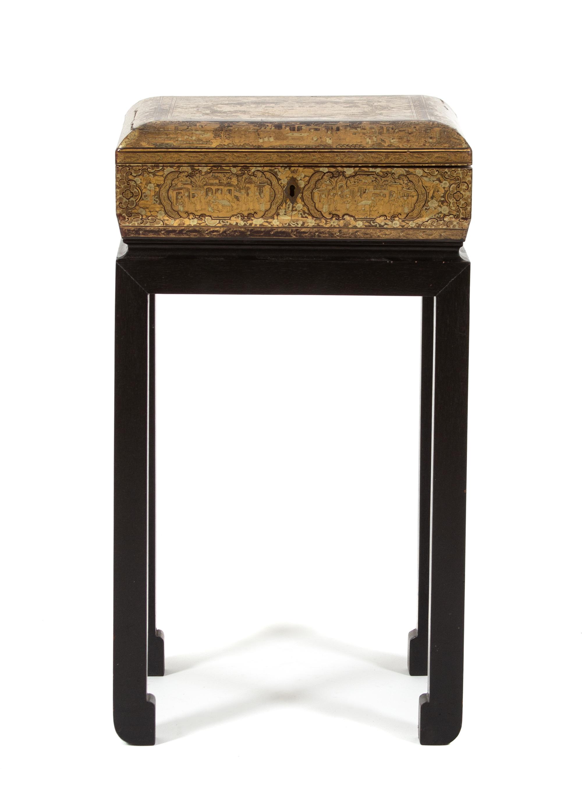 A Chinoiserie Brown and Gilt Lacquered Sewing Box on Stand Height overall 22 x width 12 x depth 10 inches. — 20TH CENTURY