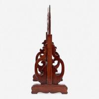 A Chinese carved and pierced huanghuali "dragon" panel, in later hardwood stand 黄花梨镂雕龙纹木板 后配底座 The panel late Ming/Qing dynasty ??????