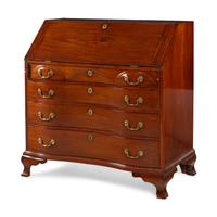 A Chippendale Walnut Serpentine Slant-Front Bureau
