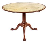 A George III Mahogany Game Table Height 28 x diameter of top 41 7/8 inches. — CIRCA 1780
