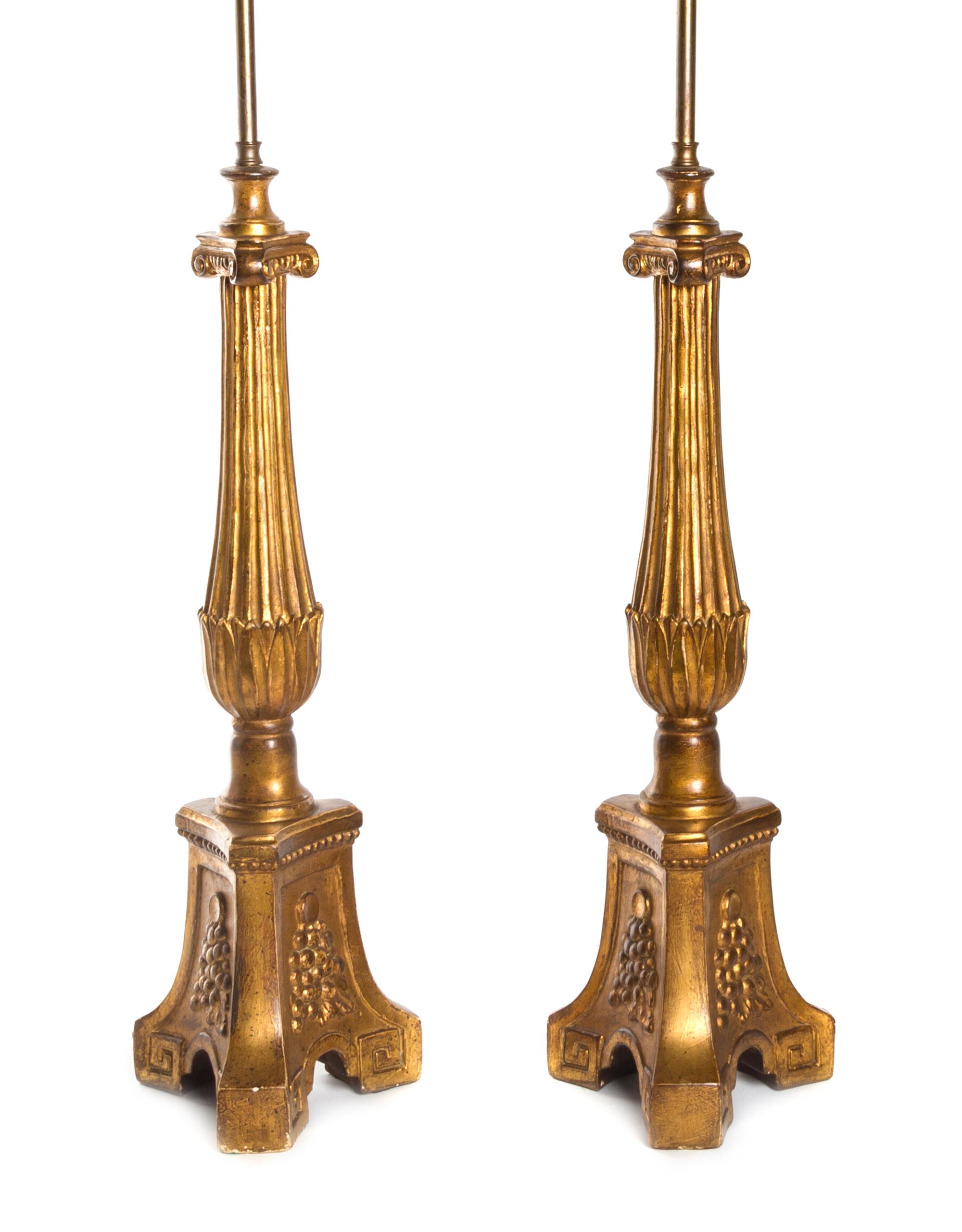 A Pair of Italian Giltwood Table Lamps, Height overall 37 inches.