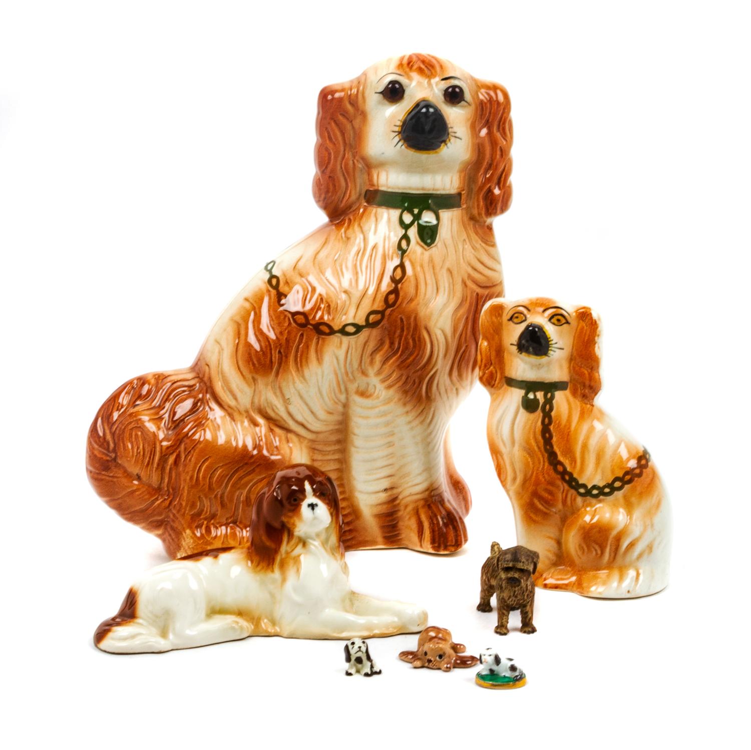 A Group of Seven Spaniels Height of tallest 13 1/2 inches.