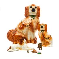 A Group of Seven Spaniels Height of tallest 13 1/2 inches.
