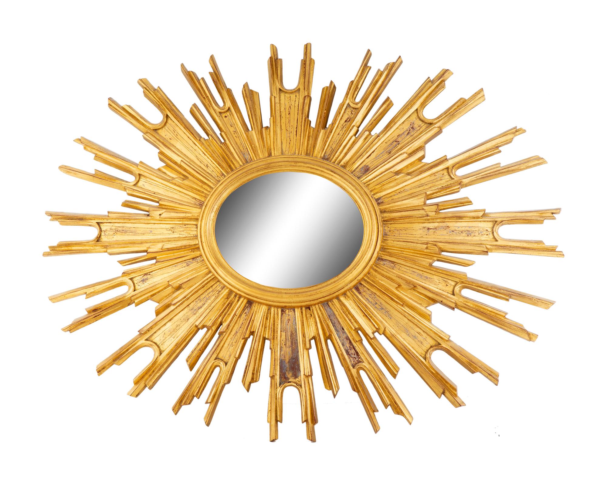A Carved Giltwood Sunburst Mirror — 20TH CENTURY