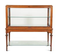 A Regency Style Mahogany Glazed Display Cabinet on Stand