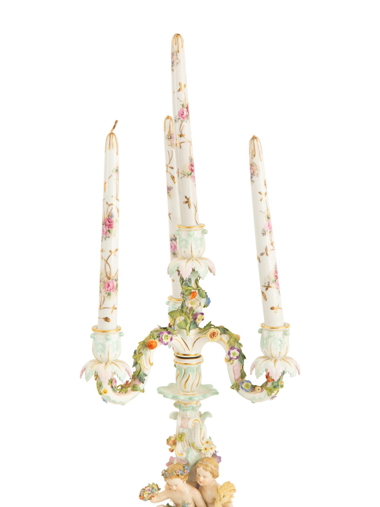 A Pair of Meissen Porcelain Figural Four Light Candelabra