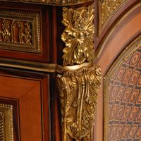 A Louis XVI Style Gilt Bronze Mounted Marquetry Marble-Top Commode