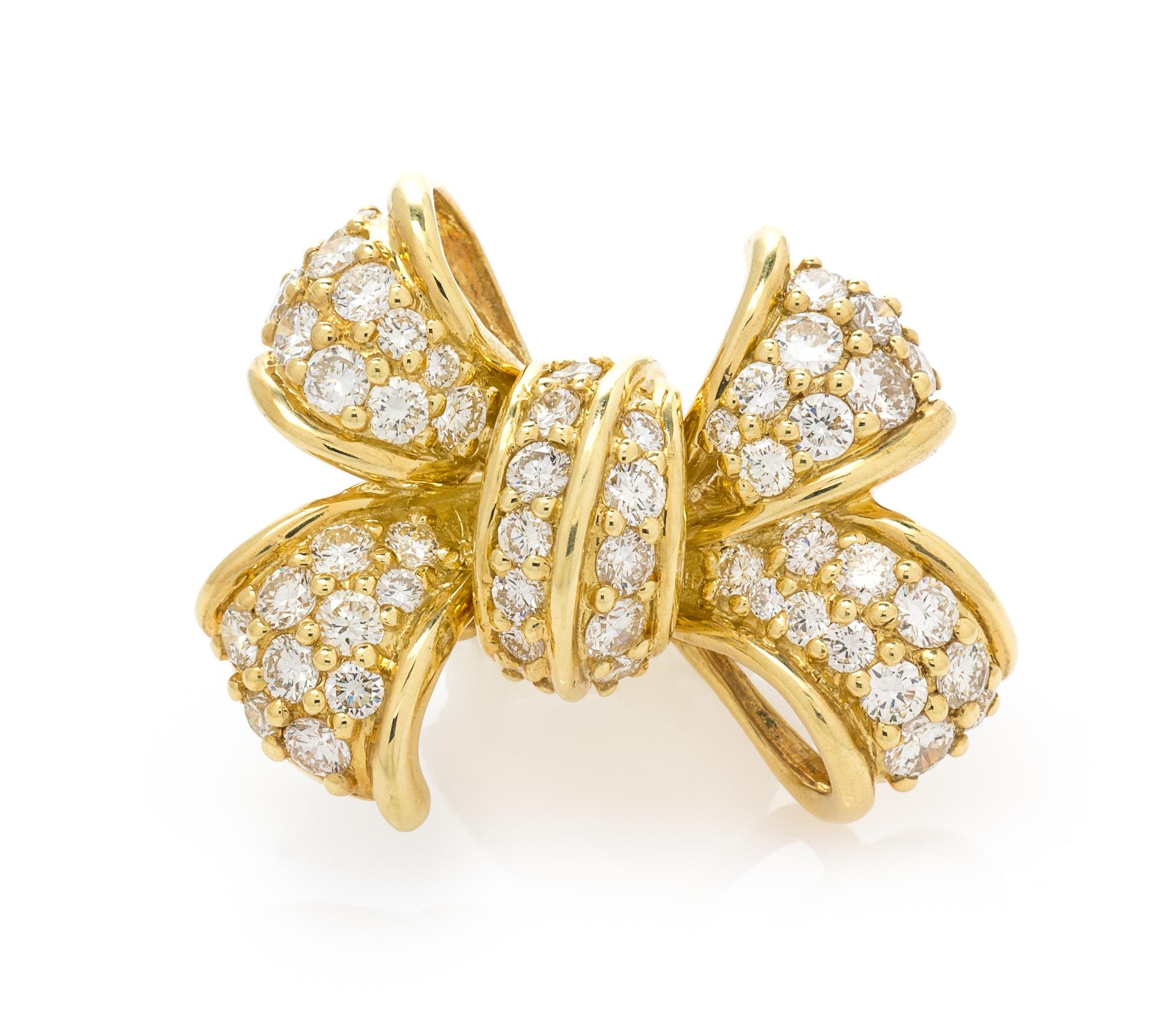 An 18 Karat Yellow Gold and Diamond Bow Motif Pendant, Jose Hess, 6.90 dwts.