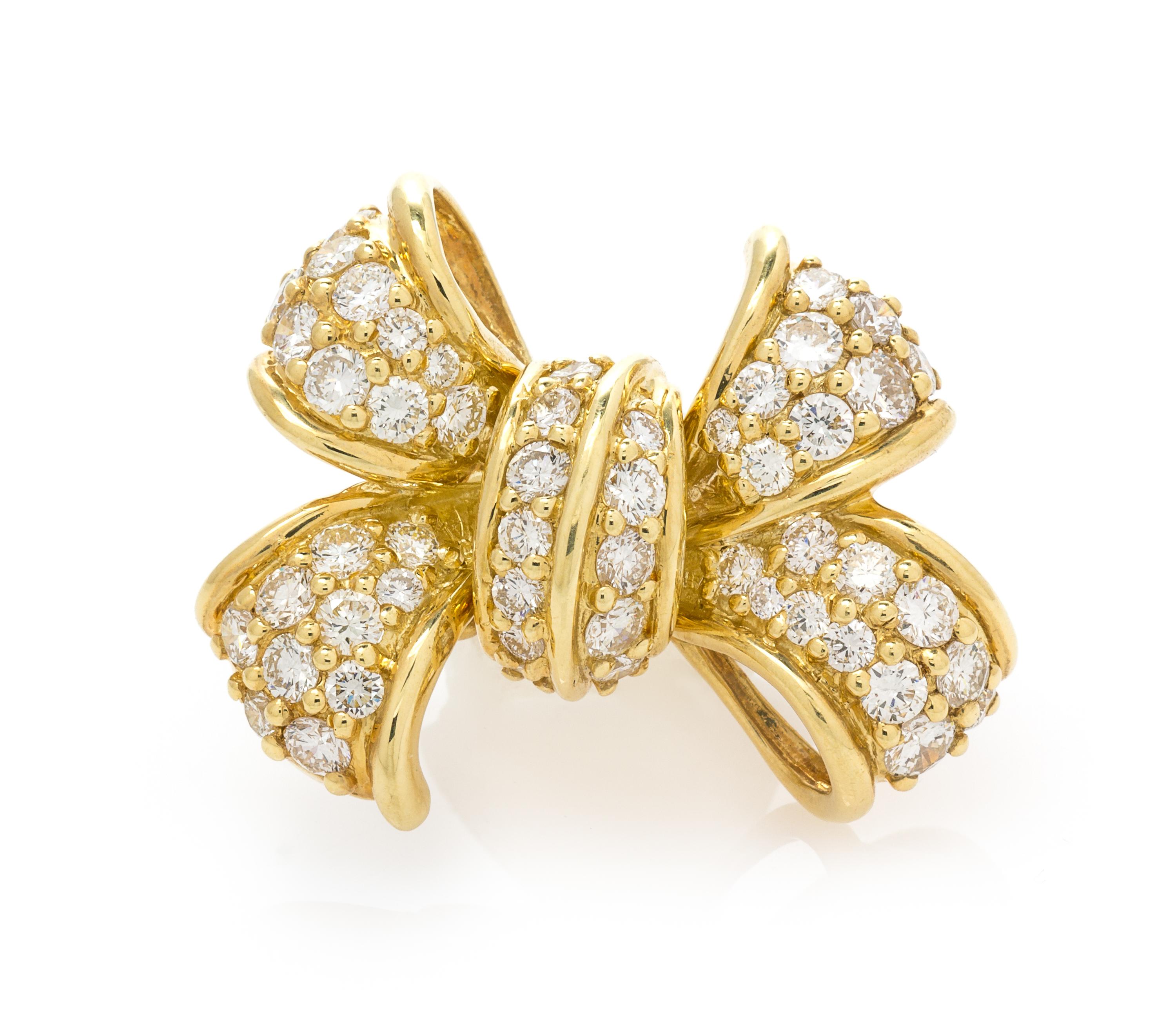 An 18 Karat Yellow Gold and Diamond Bow Motif Pendant, Jose Hess, 6.90 dwts.