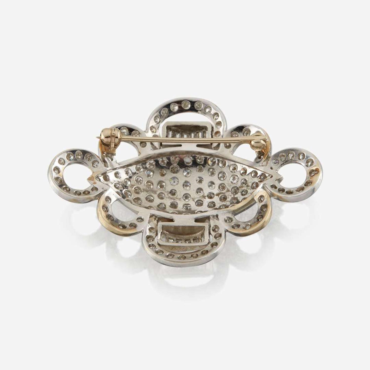 A diamond and white gold brooch