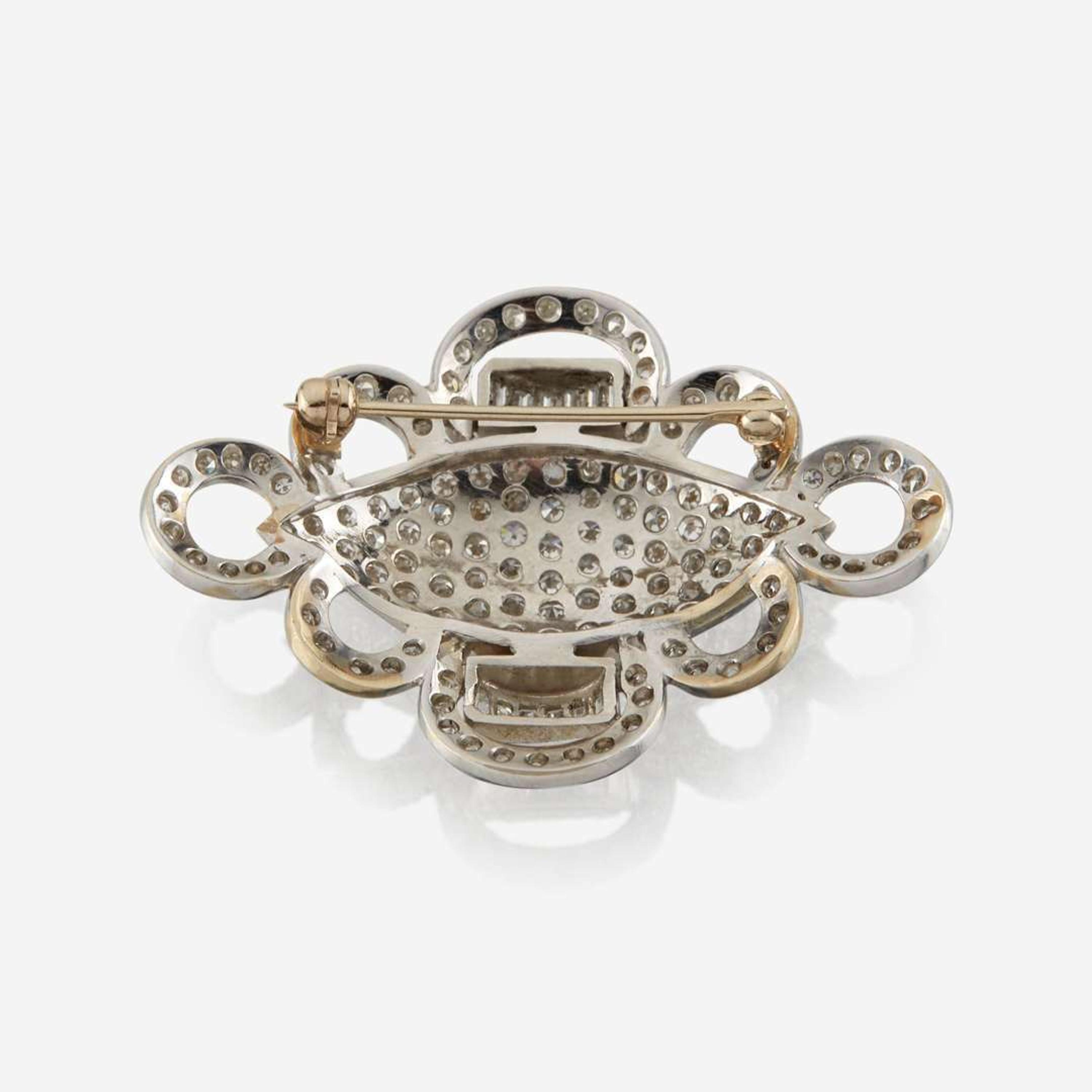 A diamond and white gold brooch