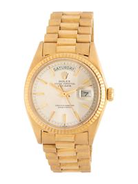 ROLEX, REF. 1803 18K YELLOW GOLD 'DAY-DATE' WATCH WITH ORIGINAL RECEIPT