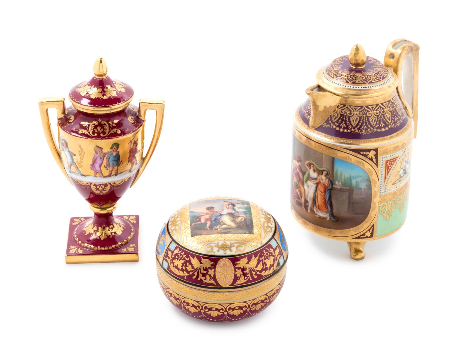 Three Vienna Painted and Parcel Gilt Porcelain Table Articles