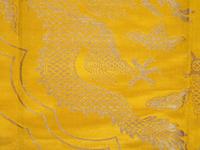 Two Chinese Yellow Embroidered Silk Panels