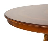 An Empire Style Inlaid Beechwood and Parcel Gilt Center Table by Hurtado