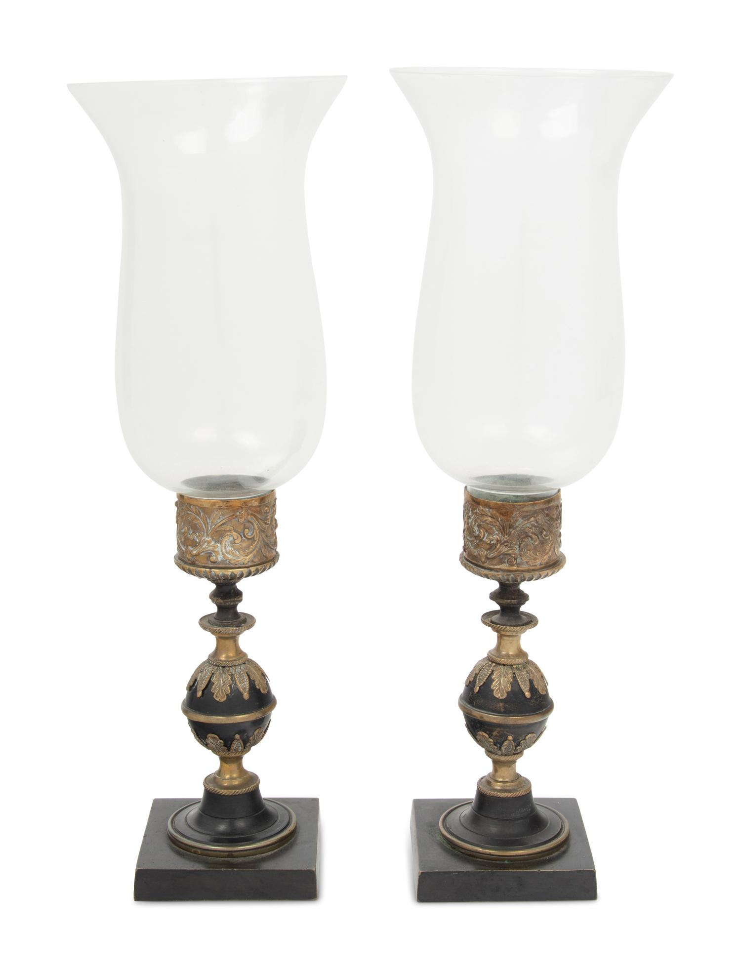 A Pair of Continental Metal Candlesticks