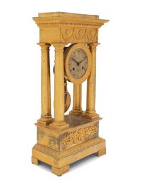 A Charles X Gilt Bronze Mantel Clock