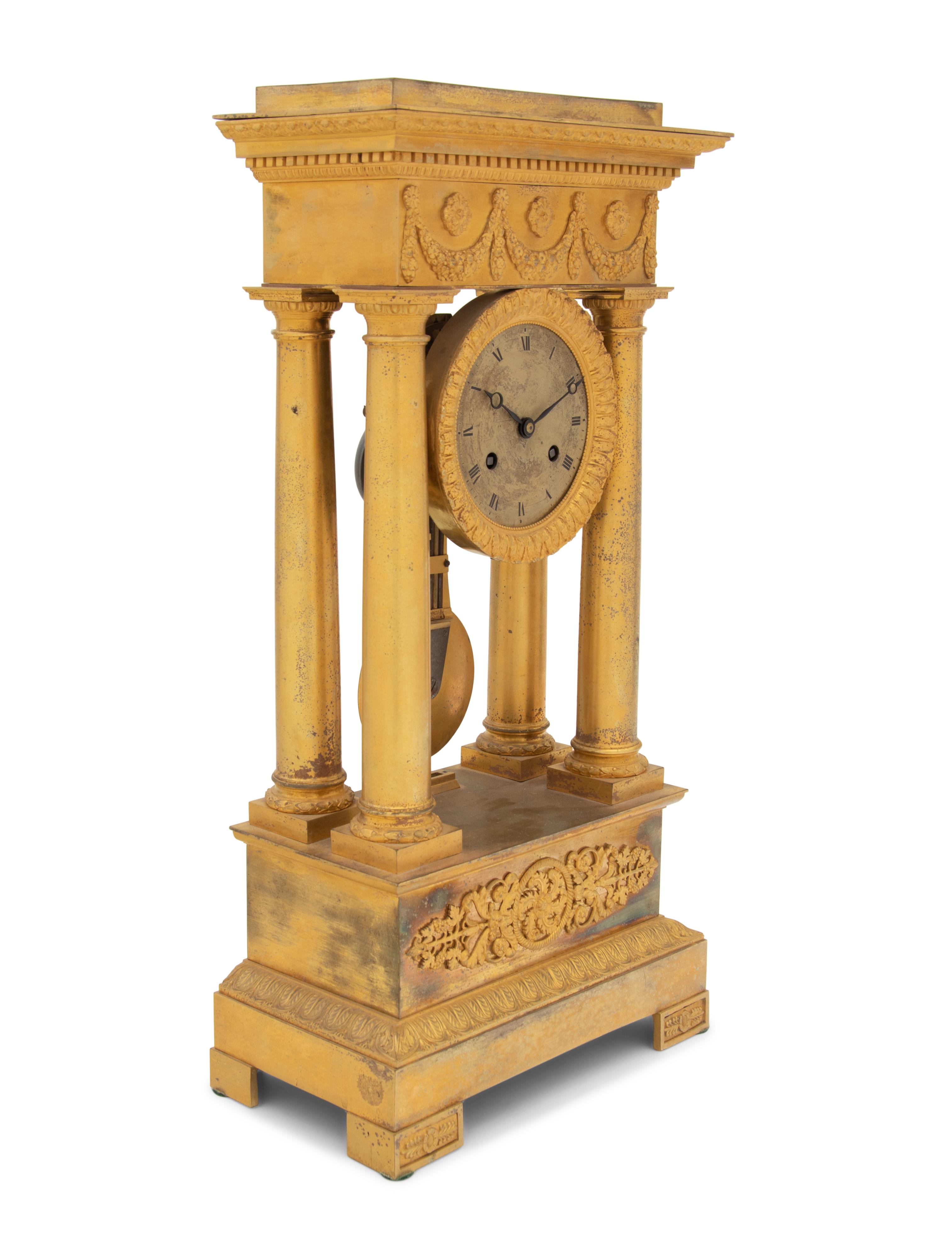 A Charles X Gilt Bronze Mantel Clock