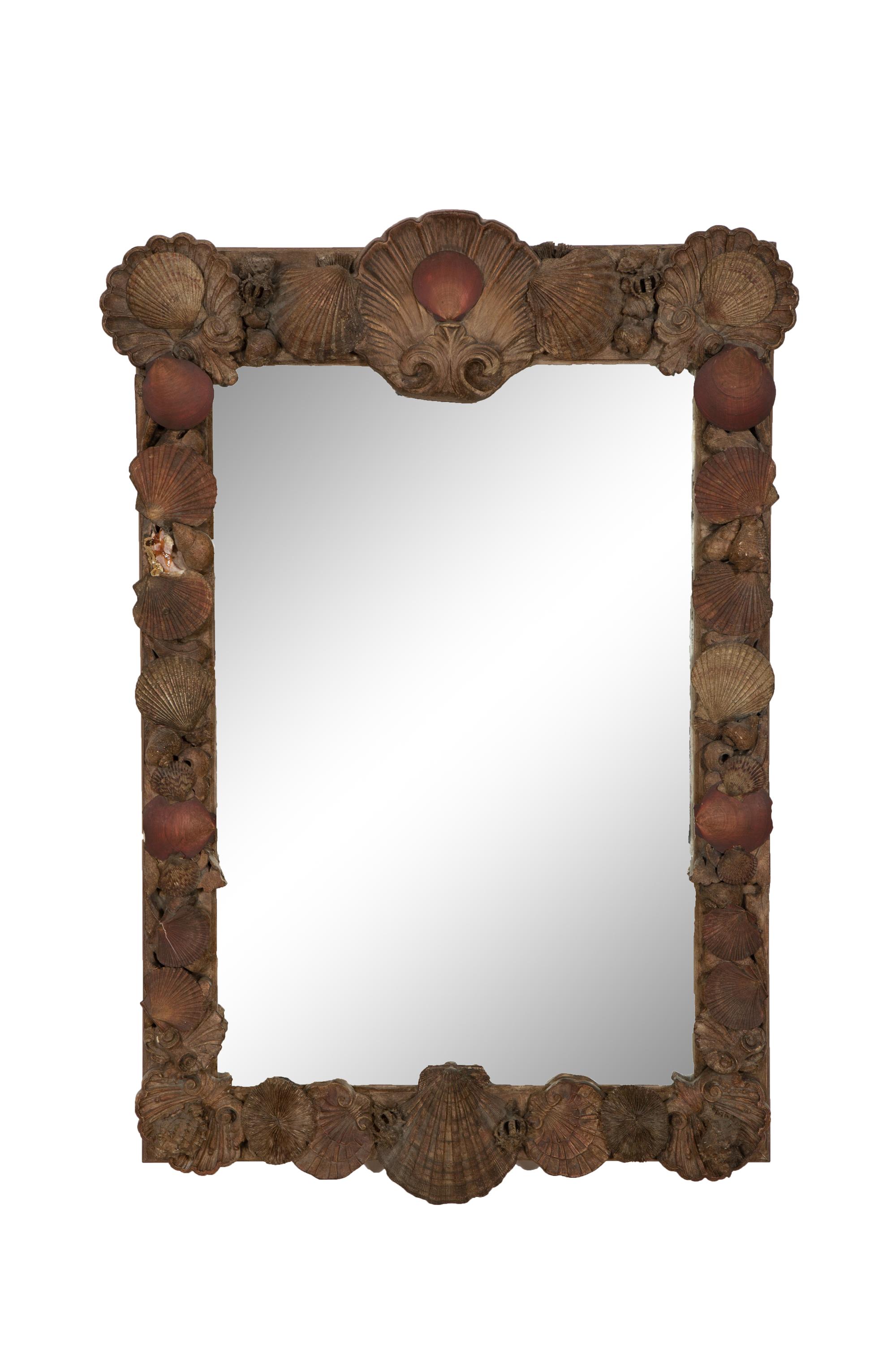 A Grotto Style Carved Giltwood Mirror