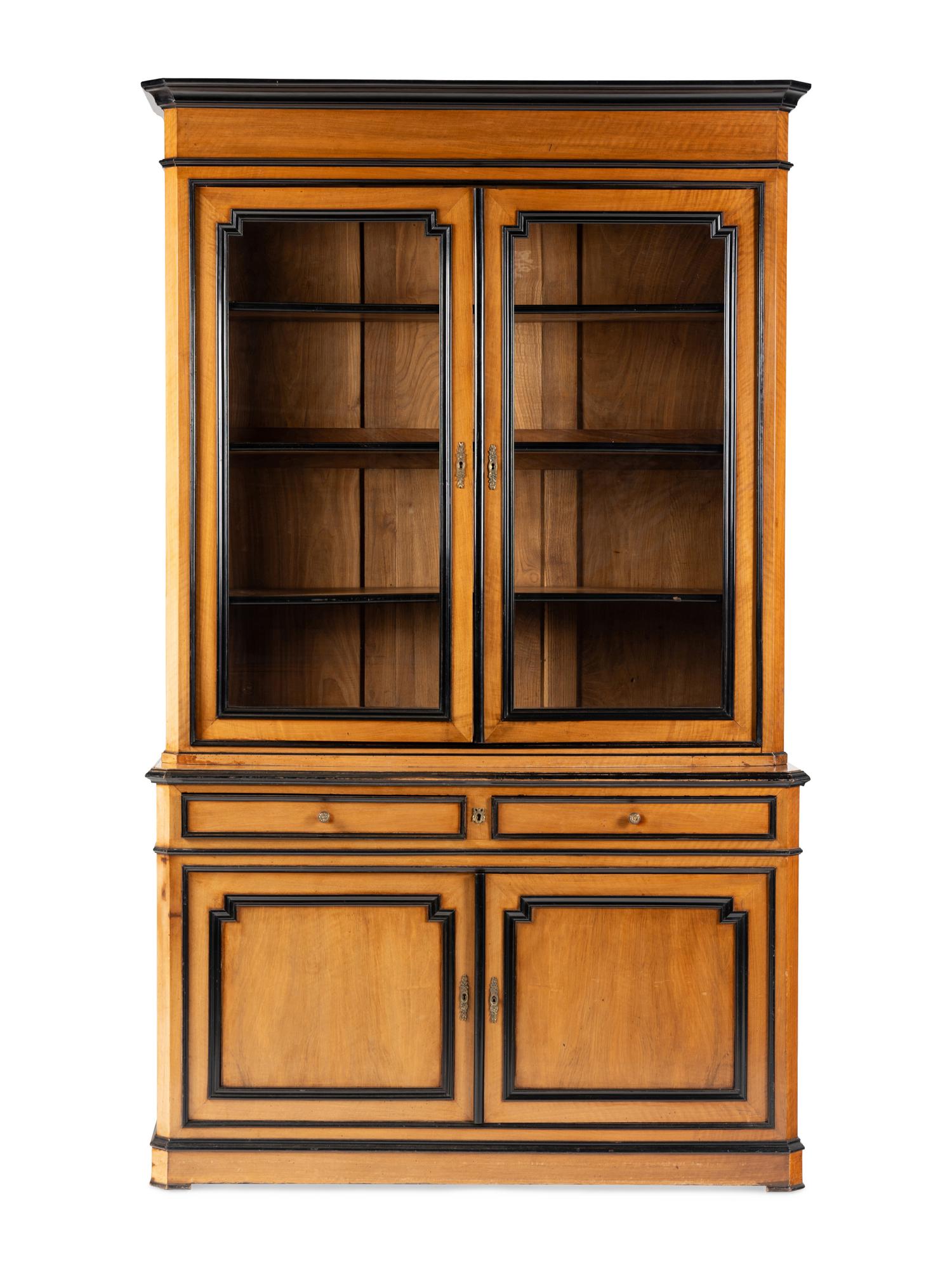 A Restauration Walnut and Part-Ebonized Bibliothèque