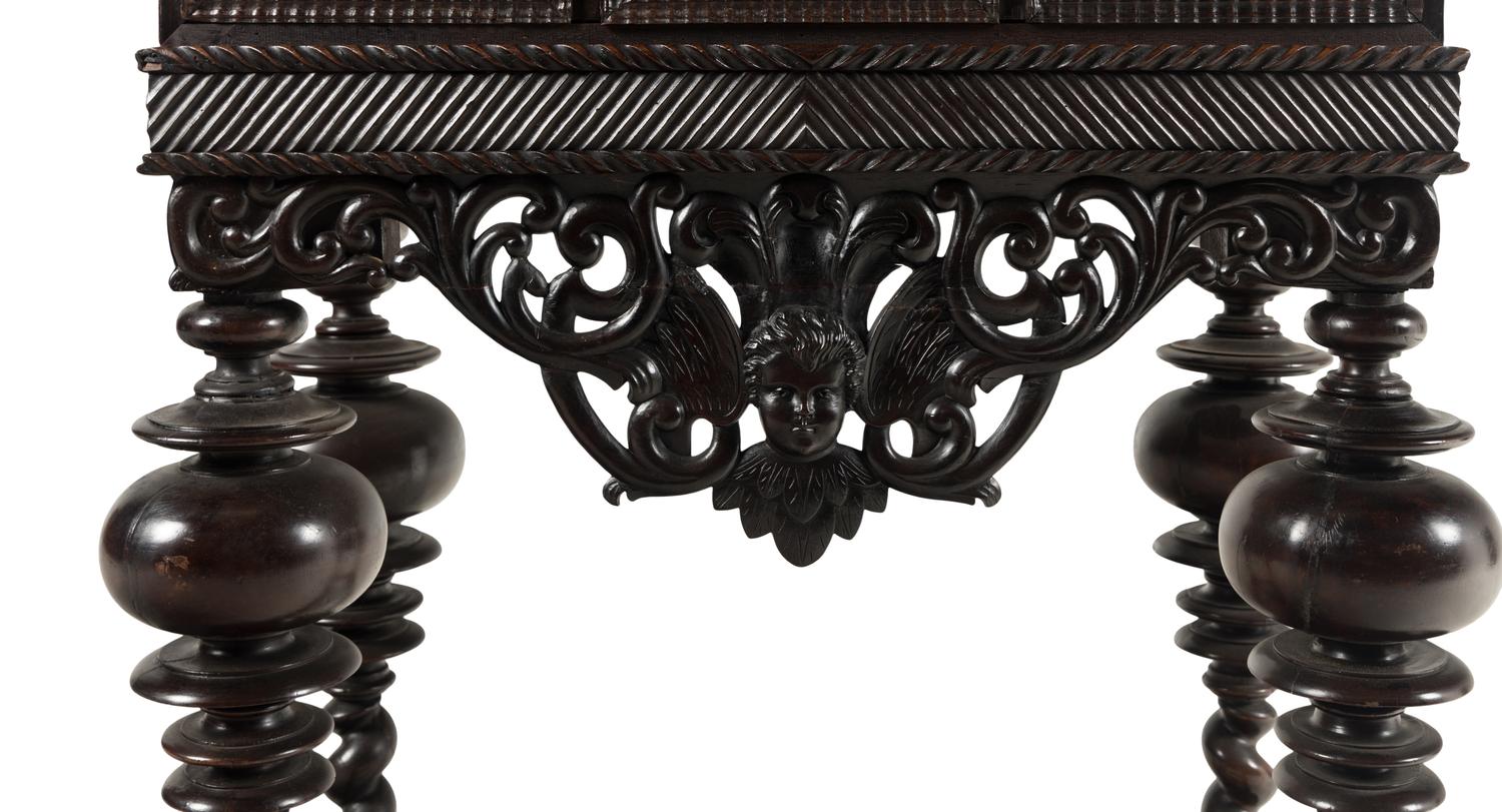 A Portuguese Baroque Style Carved Walnut Cabinet on Stand