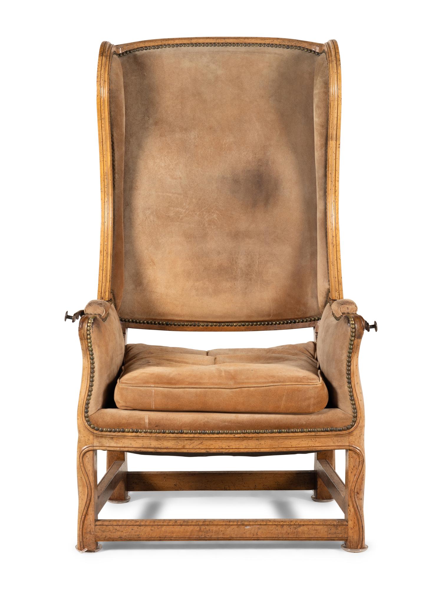 A Louis XV Provincial Style Carved Reclining Easy Chair