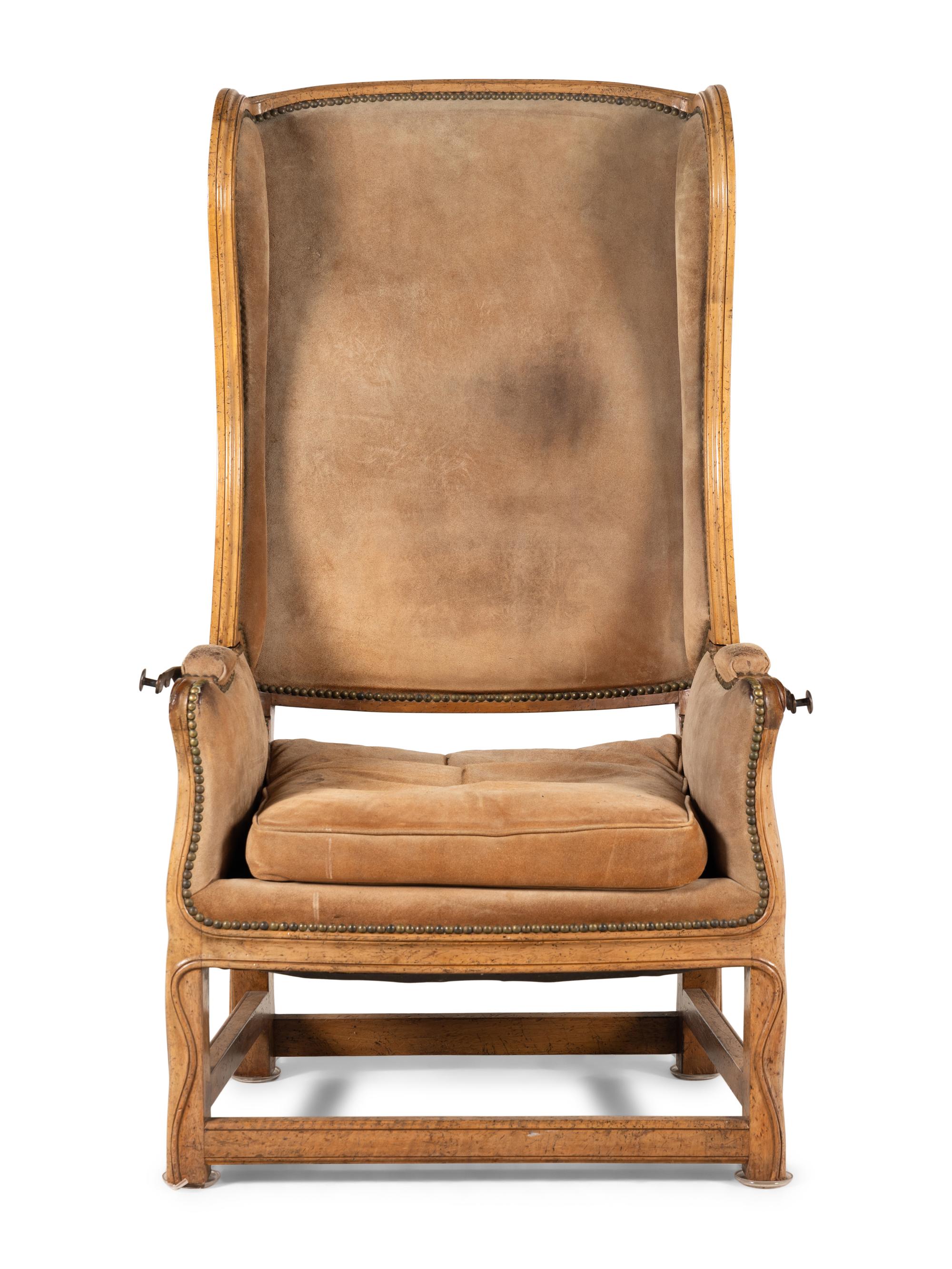 A Louis XV Provincial Style Carved Reclining Easy Chair