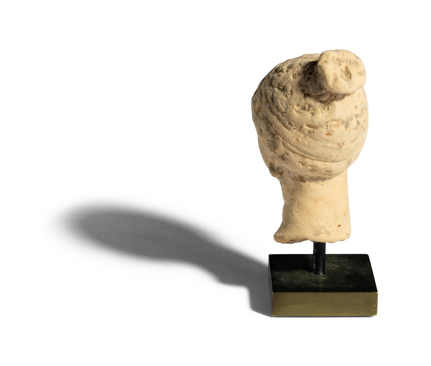 A Greek Terracotta Head of a Woman