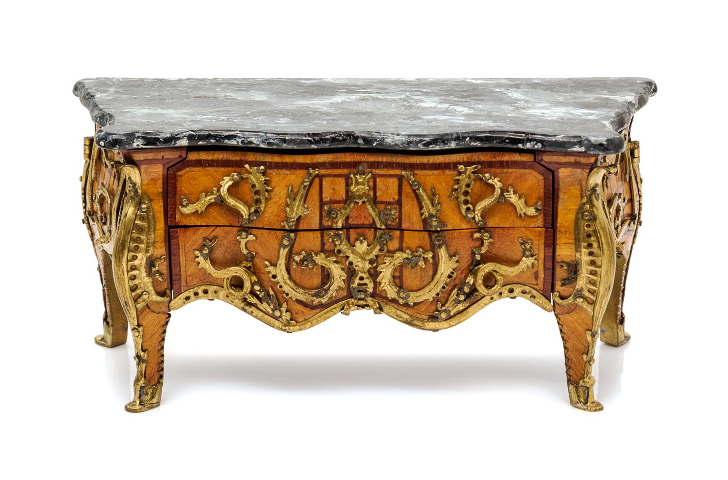 A Louis XV Style Marquetry and Gilt Metal Mounted Commode Height 2 5/8 x width 5 5/8 x depth 2 1/4 inches. — Denis E. W. Hillman, 1974
