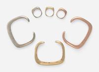 A Collection of Matching Tri-Color Bracelets and Rings