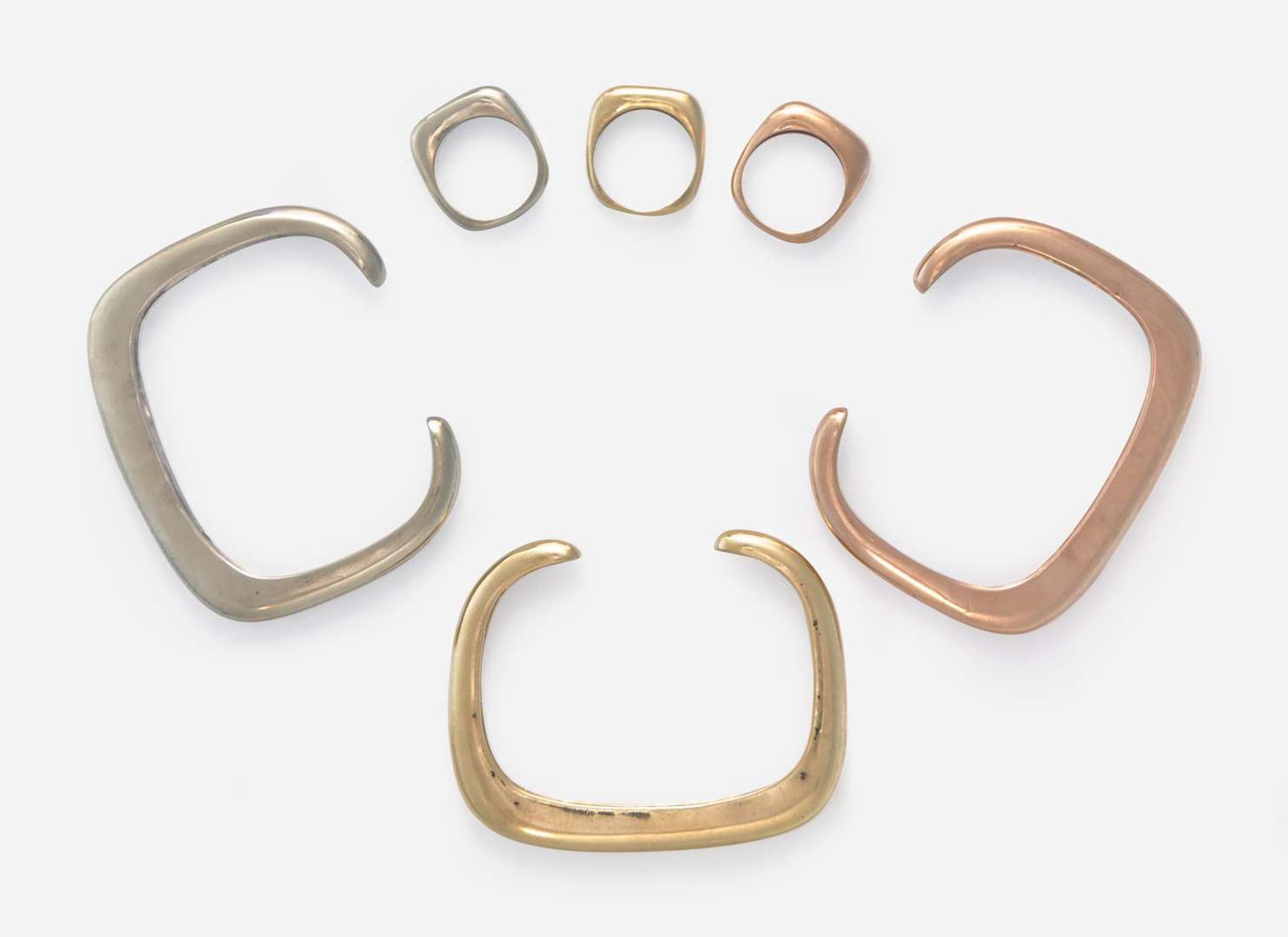 A Collection of Matching Tri-Color Bracelets and Rings