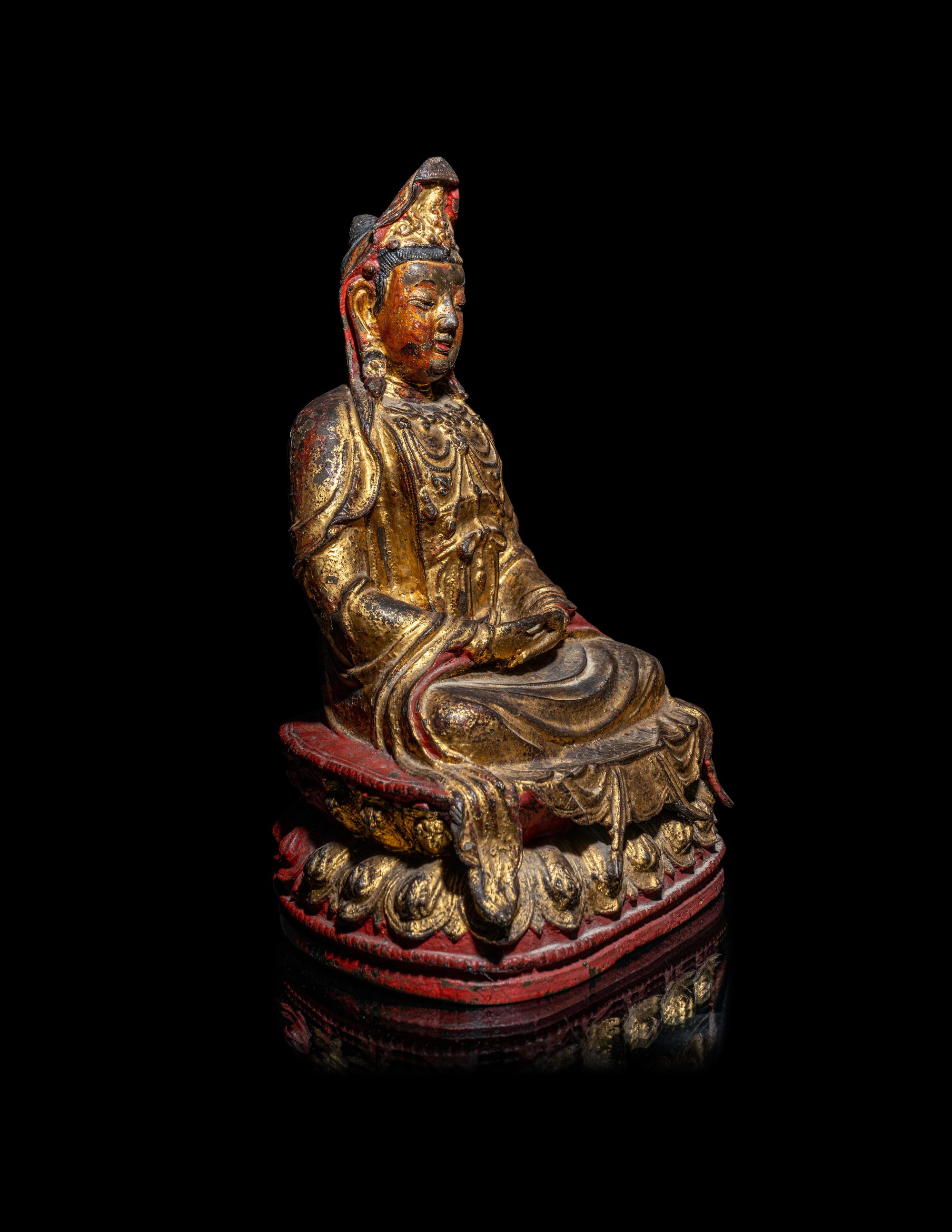 A Chinese Red-Lacquered Bronze Figure of Guanyin
