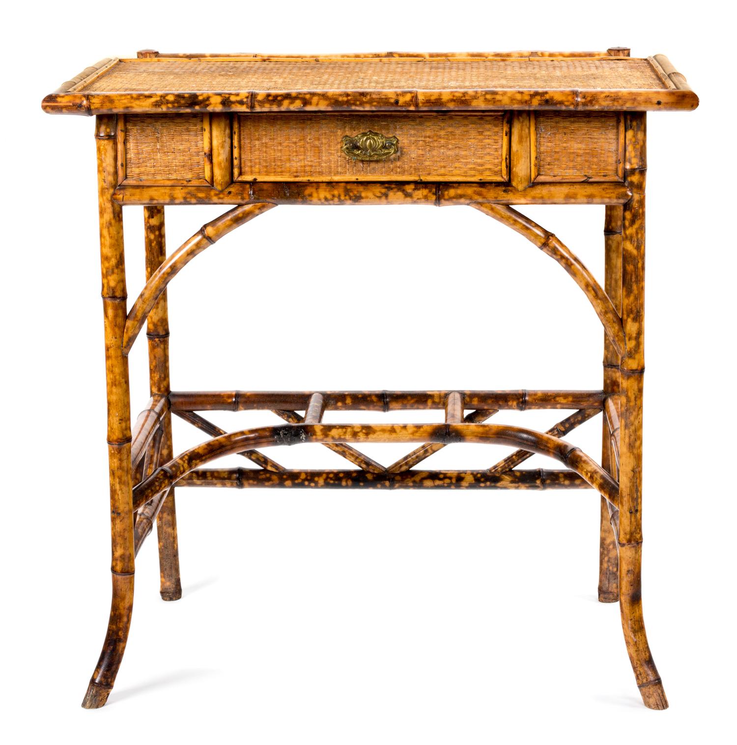 A Victorian Bamboo and Rattan Side Table Height 32 1/2 x width 32 x depth 18 inches.