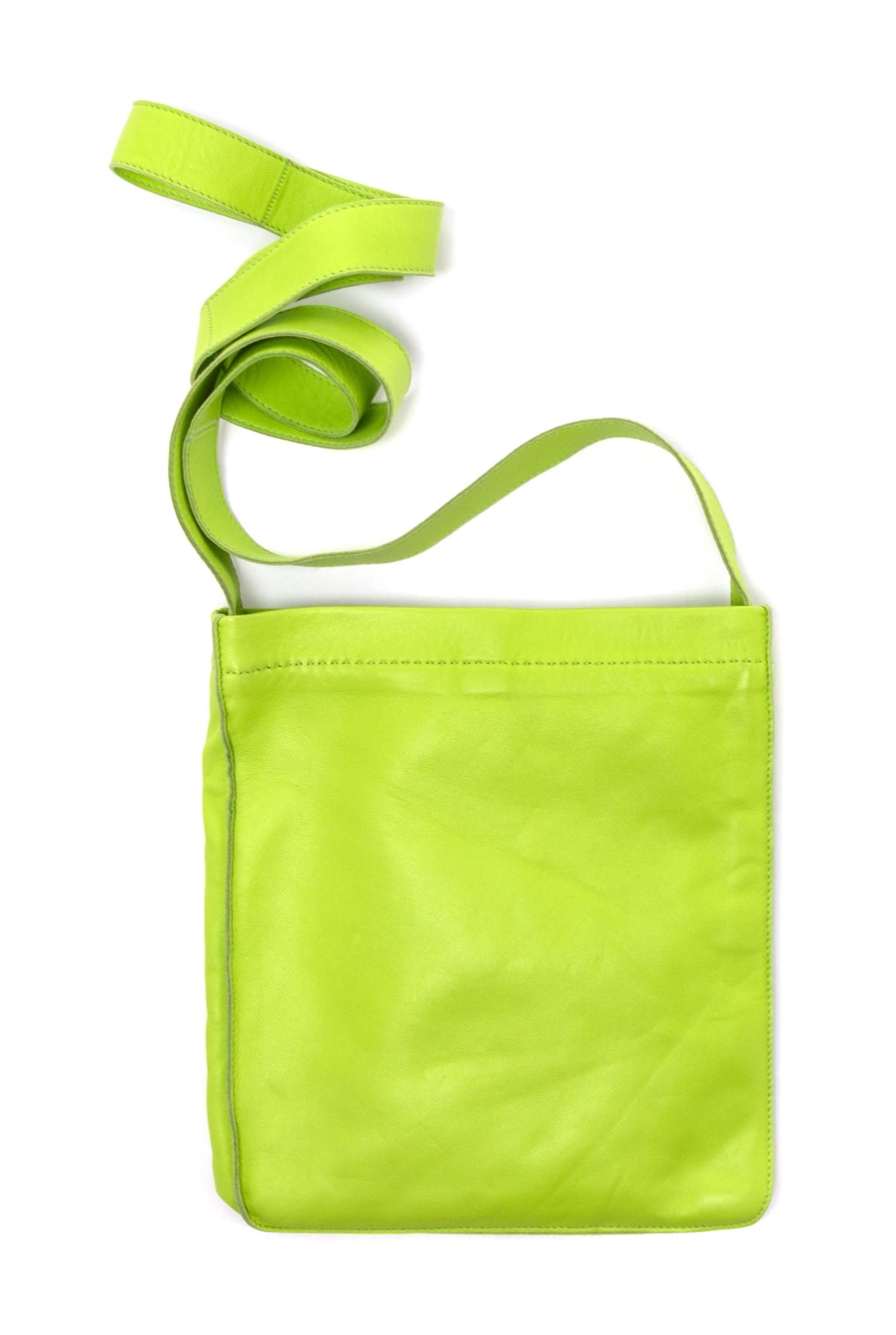 An Hermes Kiwi Agneau Clou de Selle Pouch, 6" x 9" x 1".